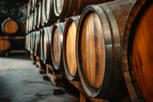 Picture of oak barrels filled with plum rakija, set for aging process