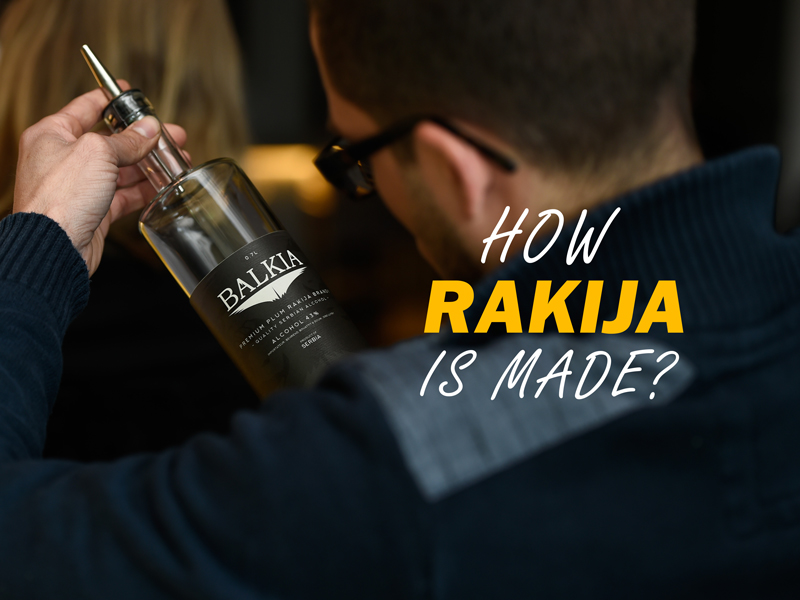 Heading image for section - how rakija is made. Man holding a bottle of Balkia Slivovitz